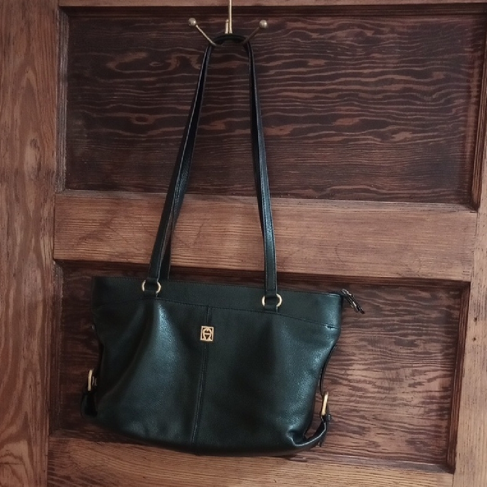 Etienne Agner Black Leather Tote With Gold Hardware.